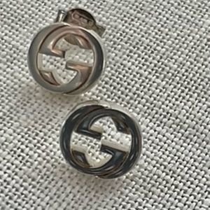 Authentic Gucci logo studs in Sterling silver